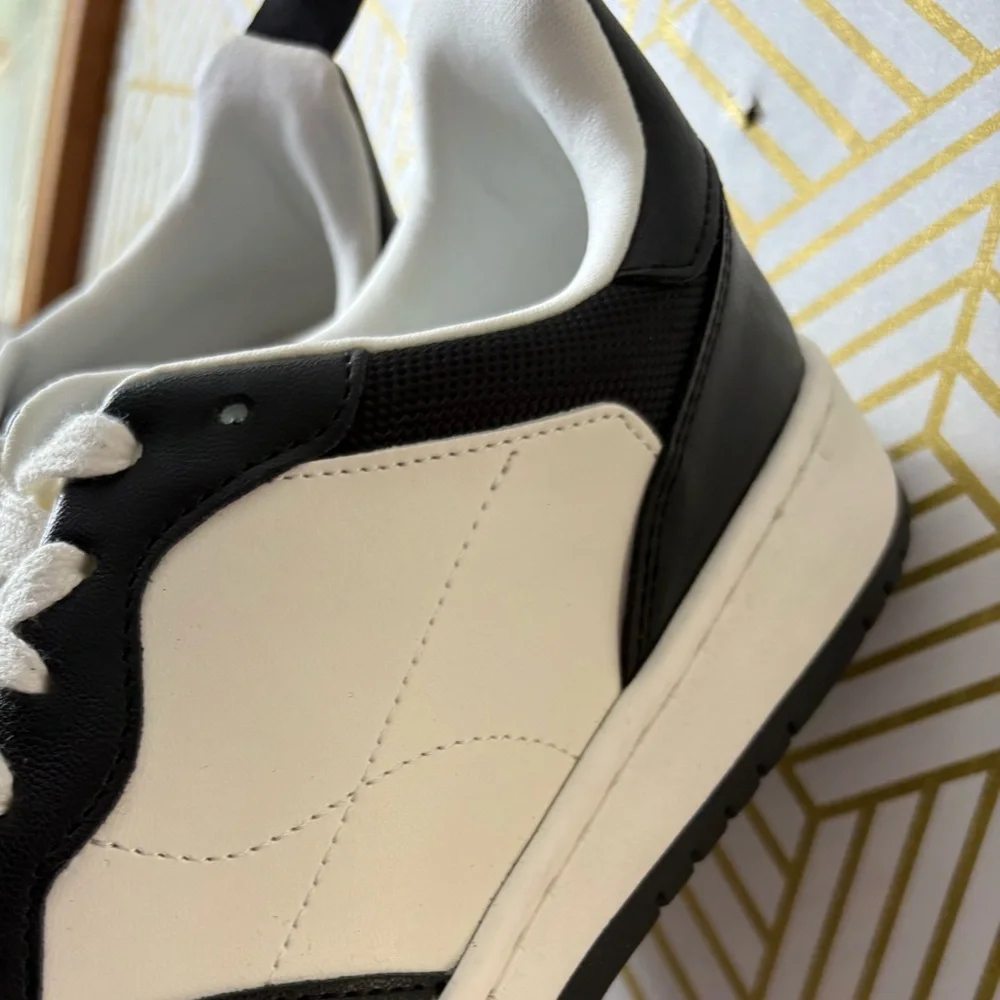 Women's Two-Tone Black and White Leather Sneakers